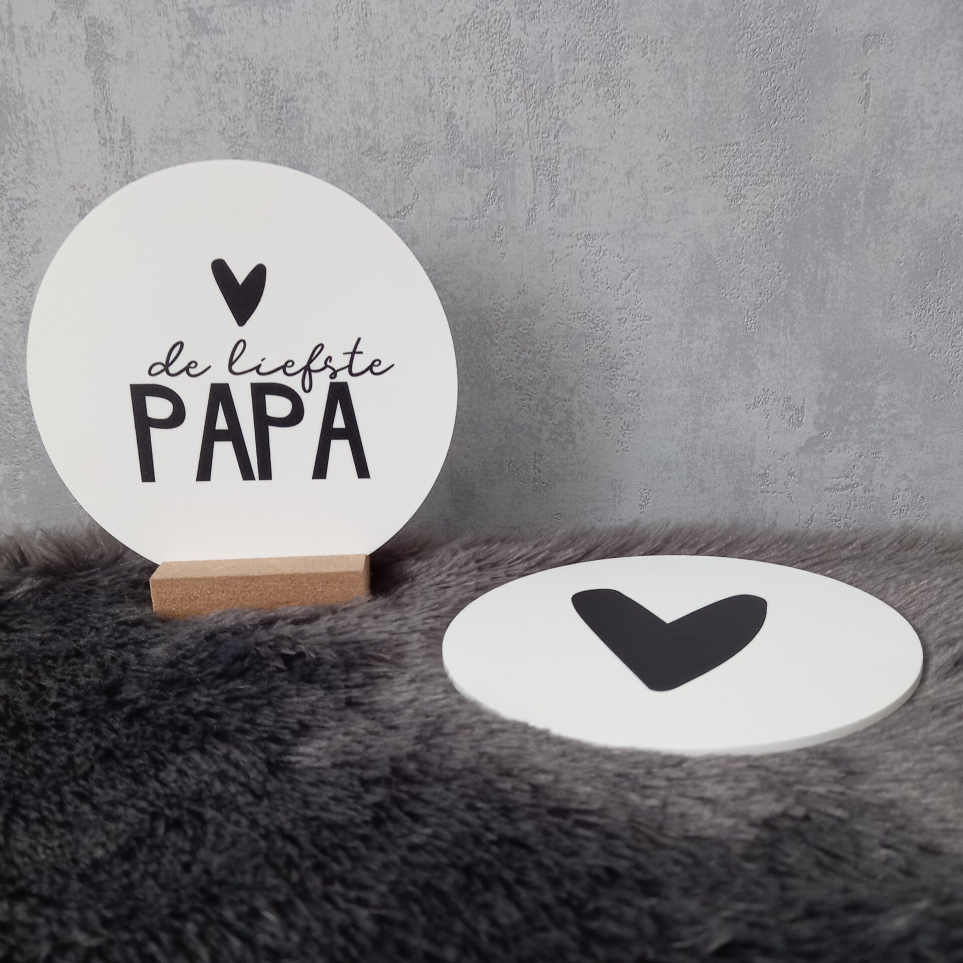 Een cirkel met een boodschap "De liefste papa"