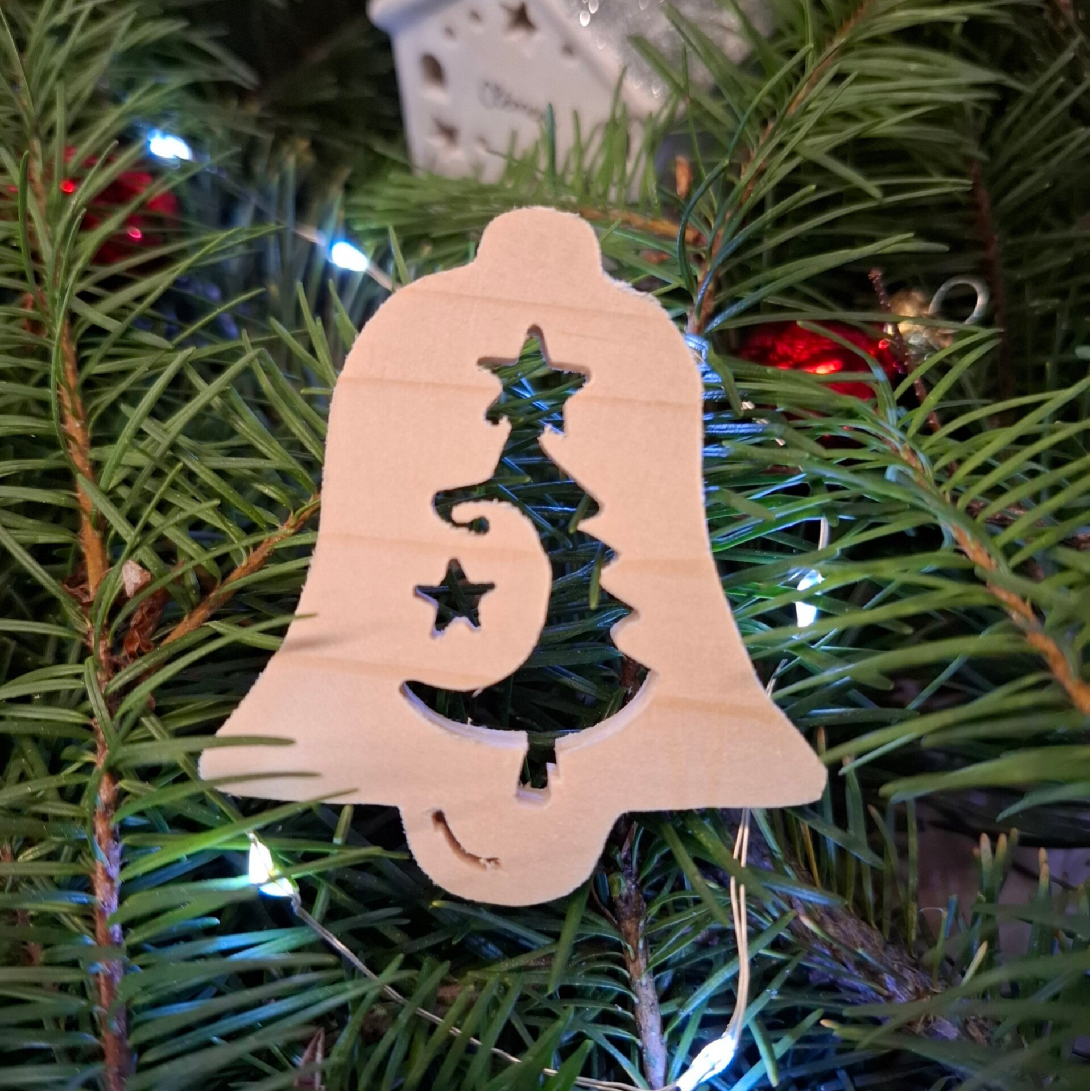 Cloche incrustée d'un sapin