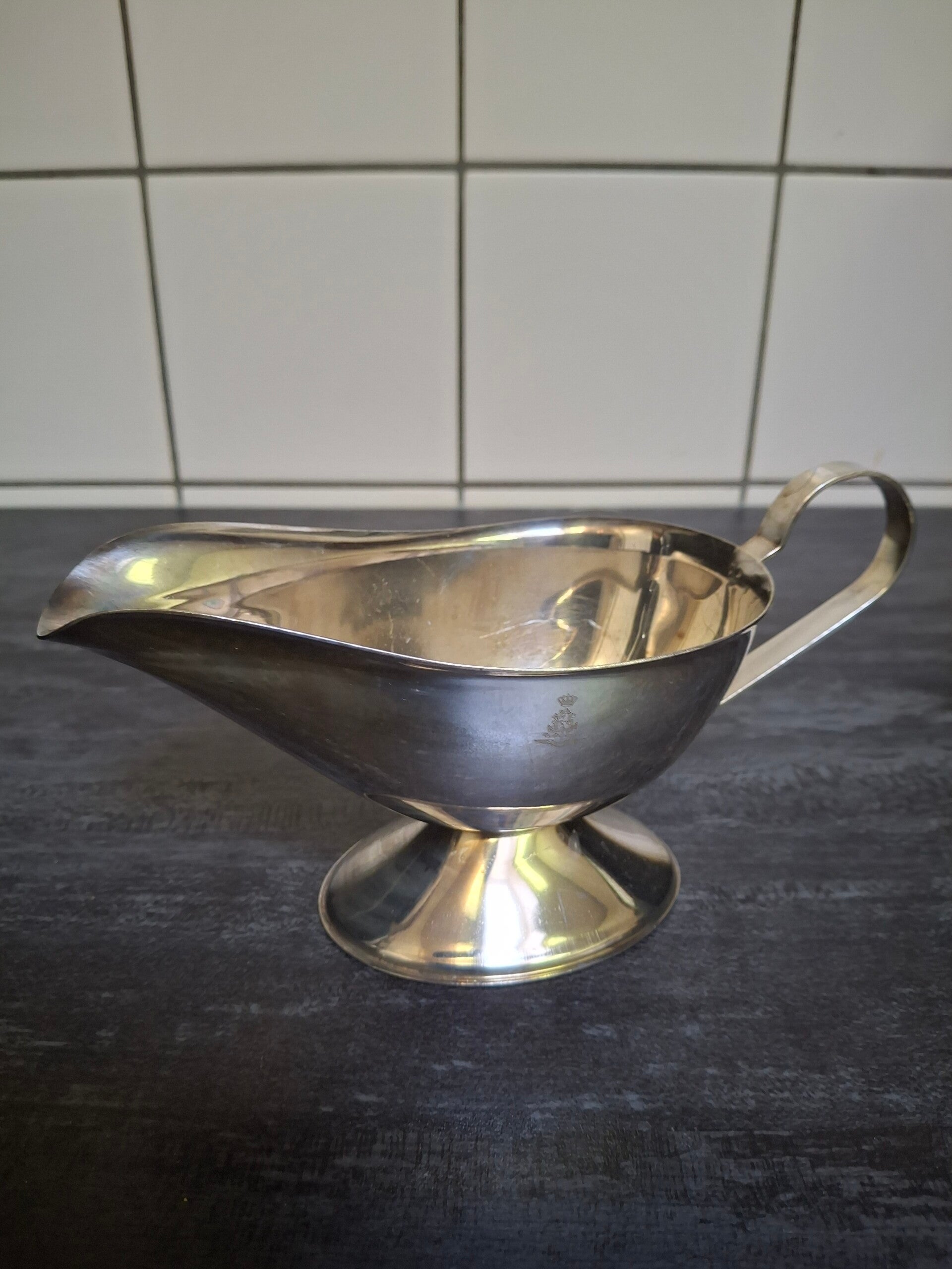 Juskom, SOLA 100 verzilverd