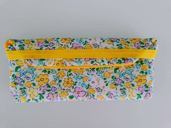 Zonnebriltasje gele bloemen