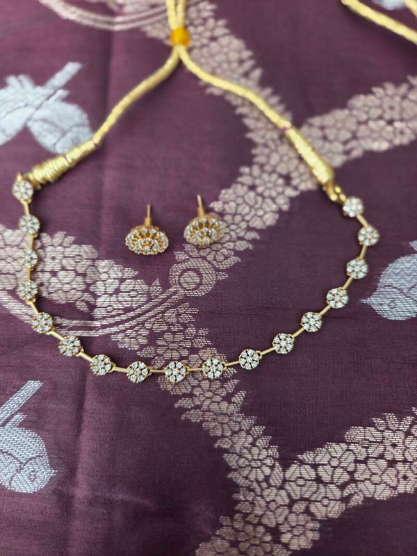 White stone neckles set