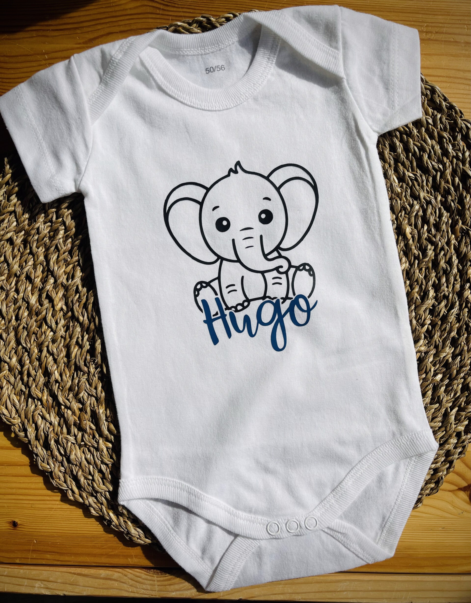 baby textiel bedrukt. romper met naam baby muts met naam