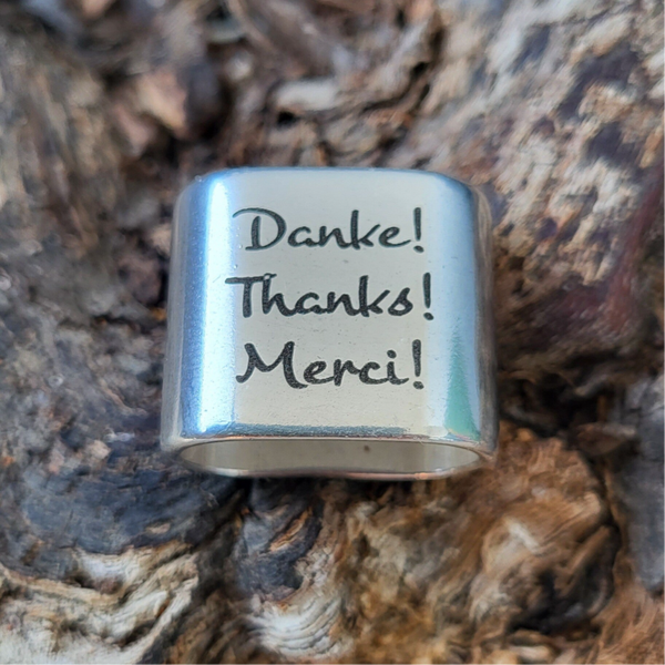 „Danke Thanks Merci“