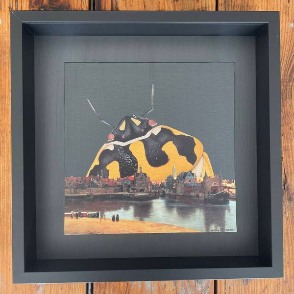 Ander gezicht op Delft 25x25x0,3 cm incl lijst 35x35x6 cm