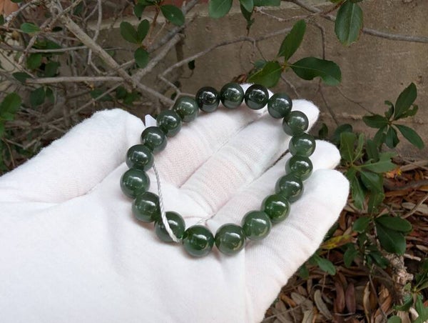 優質和田玉 Hotan Jade (湖水綠帶貓眼)