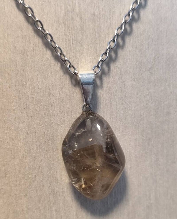 PENDENTIF PIERRE ROULEE CRISTAL DE ROCHE FUME AVEC CHAINE