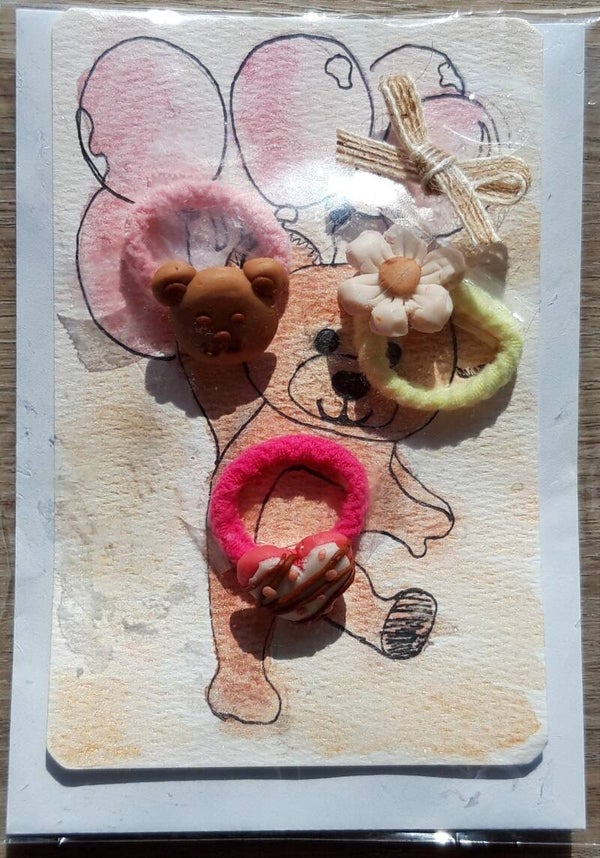 Berenkaart met drie haarelastiekjes