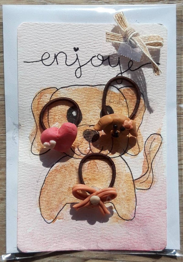 Drie elastiekjes met hondje