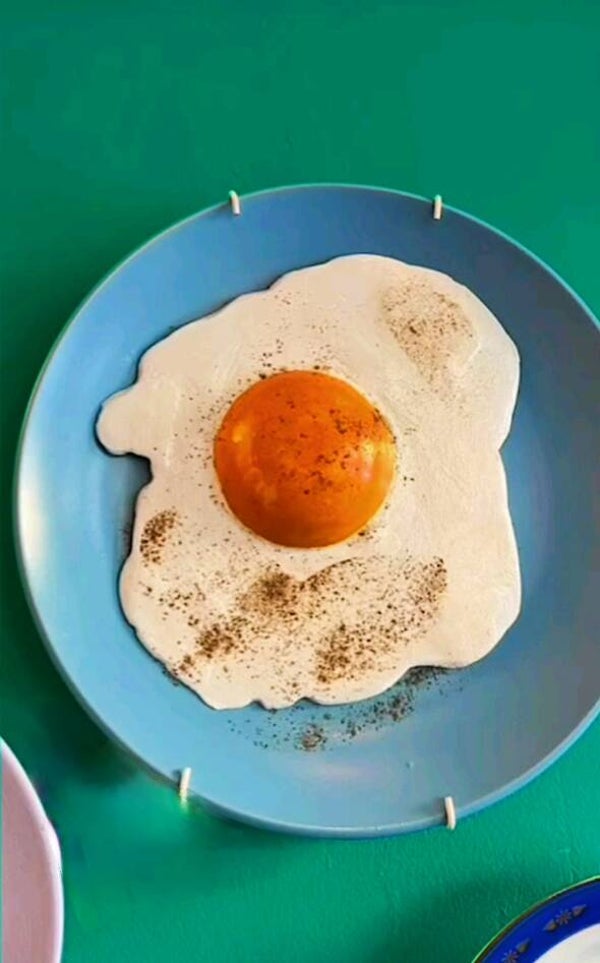 Wandbordje met spiegelei