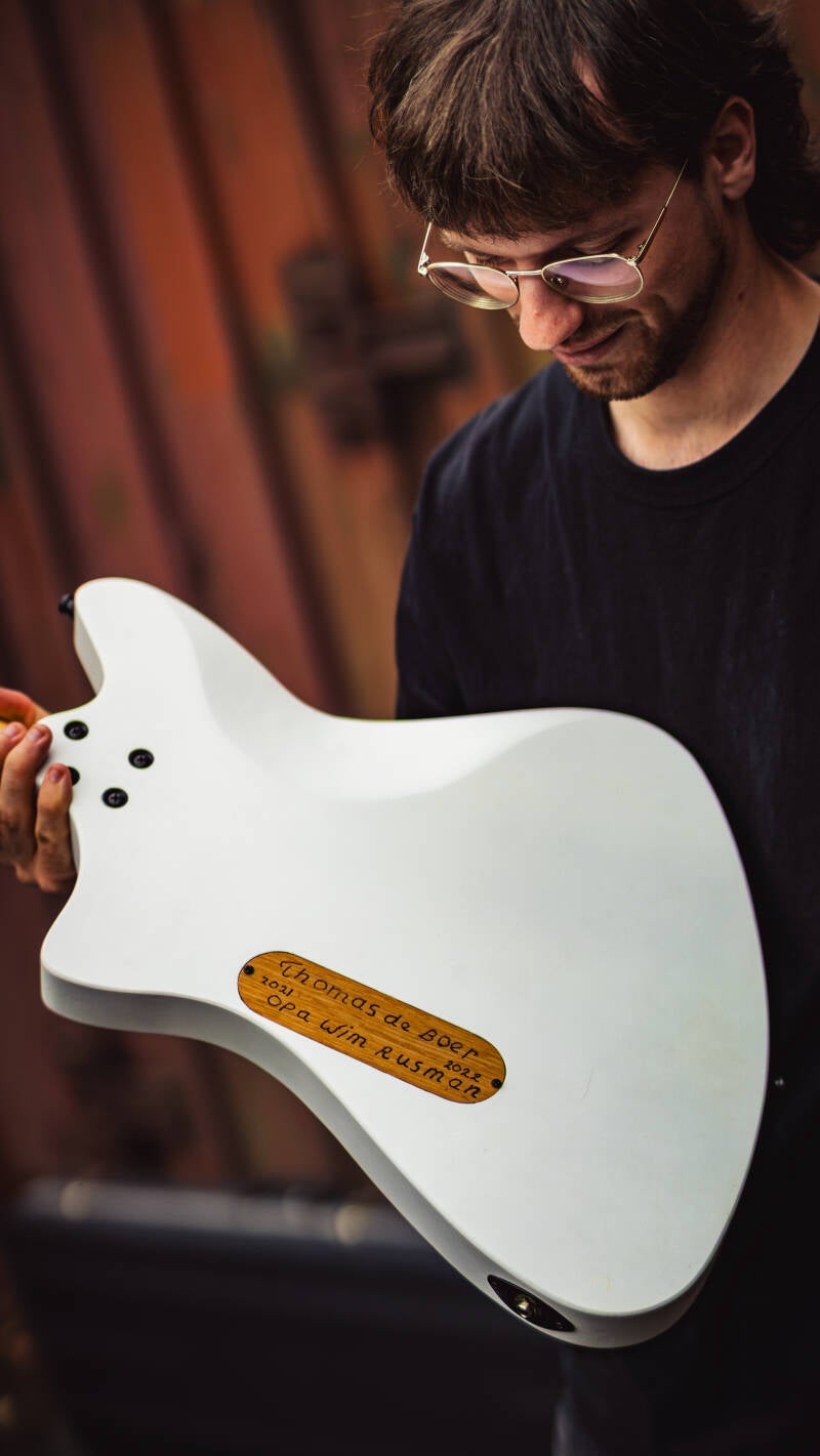 Close-up of handmade electric guitar craftsmanship by Aether Guitars