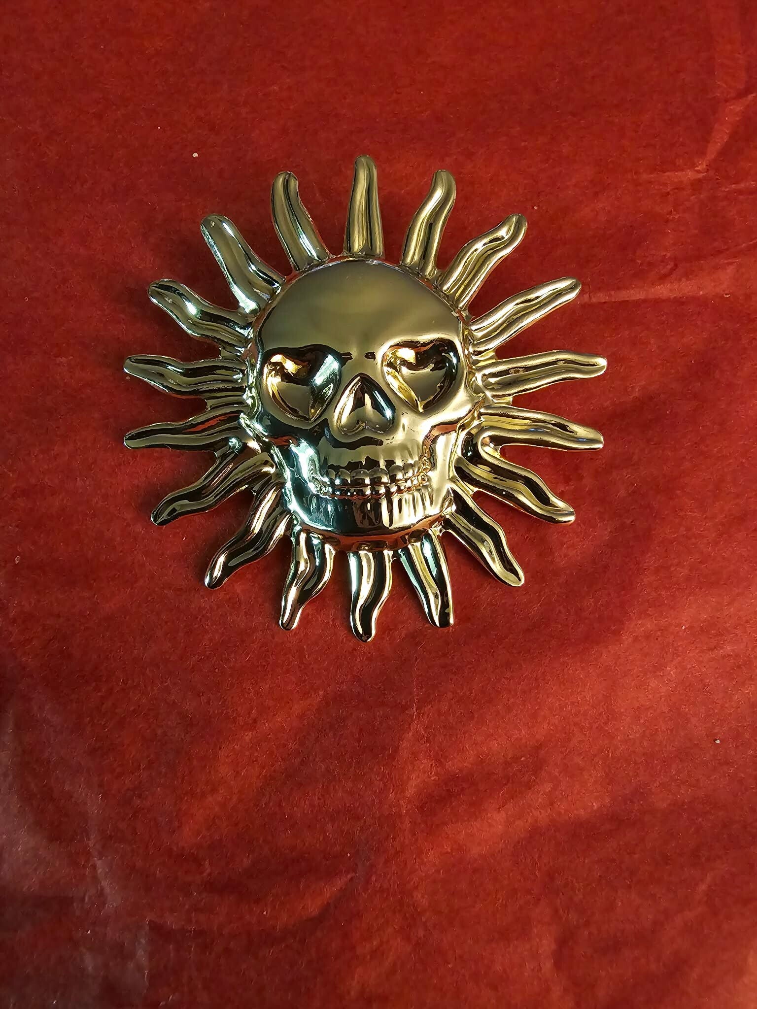 Broche soleil TDM