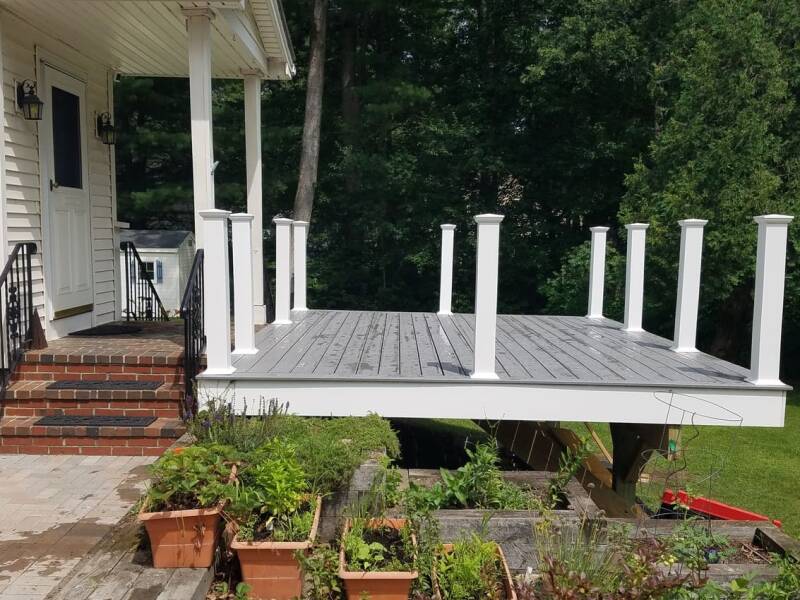 Composite deck build in progress with framing and structural supports visible.