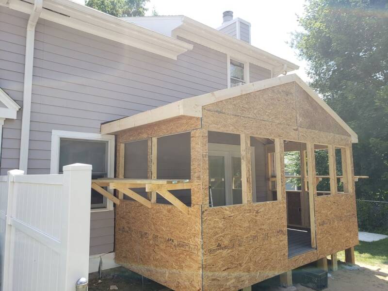 Addition build showing roof framing and structural progress during construction.