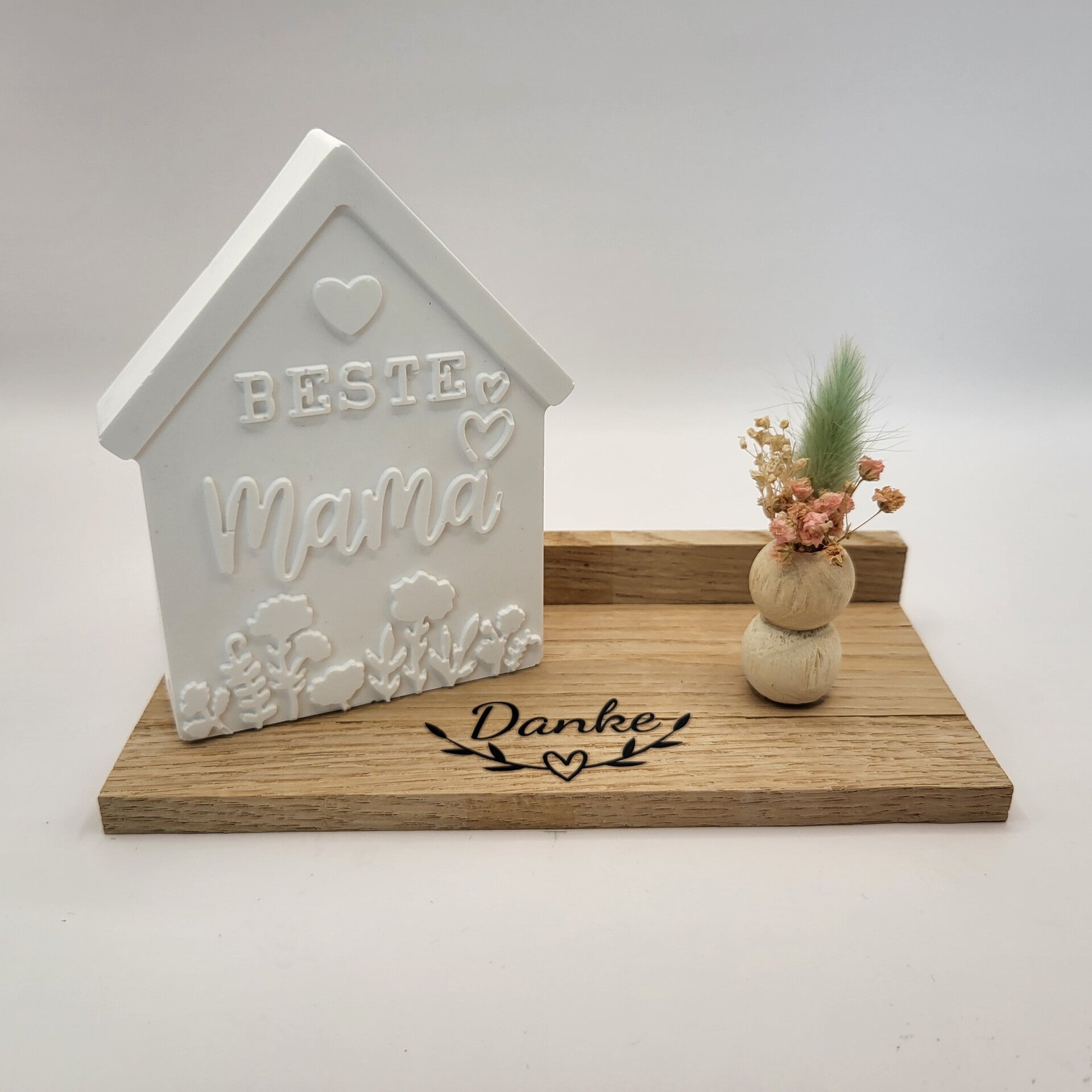 "Beste Mama" Haus auf Holzuntergrund