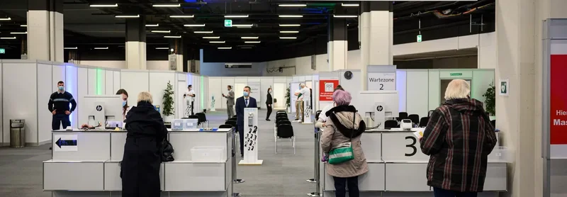 People waiting in line at a registration office in Switzerland