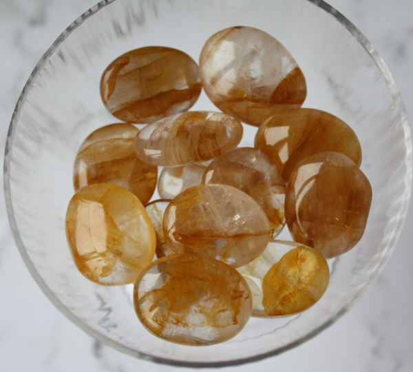 Golden healer amulet trommelsteen