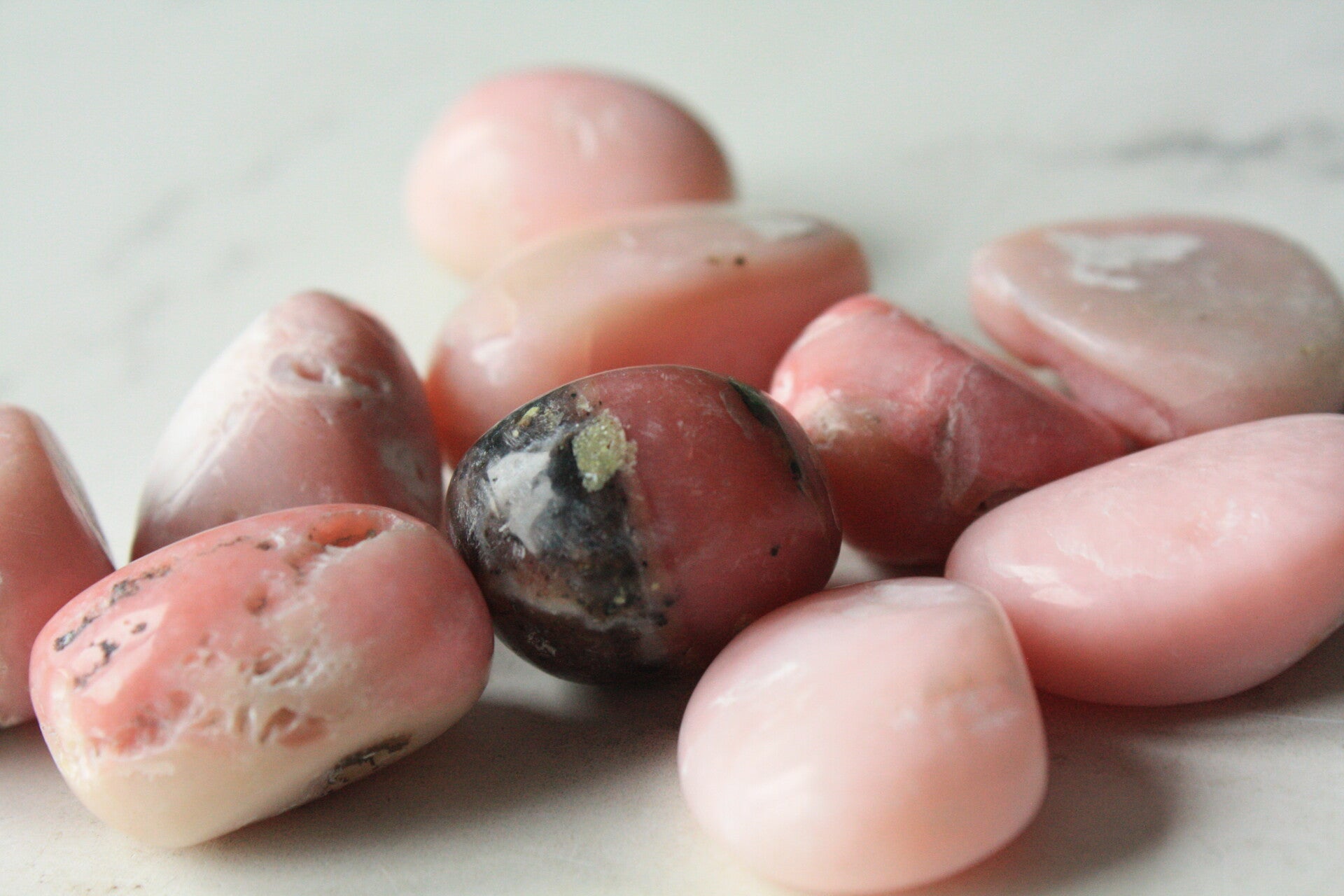 Roze opaal trommelsteen