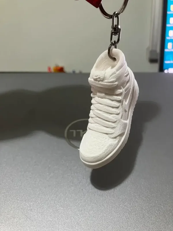 llavero de zapatilla Nike