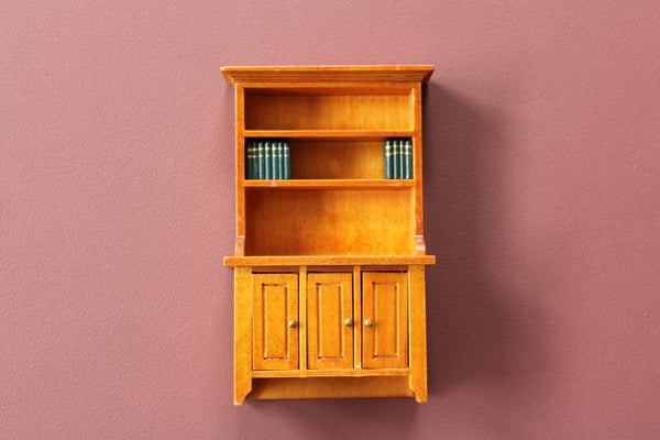 Boekenkast (inclusief vastgelijmde groene boeken)