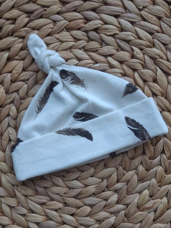 Knoopmutsje veertjes