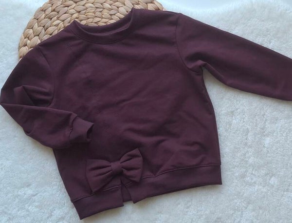 Sweater aubergine met strik