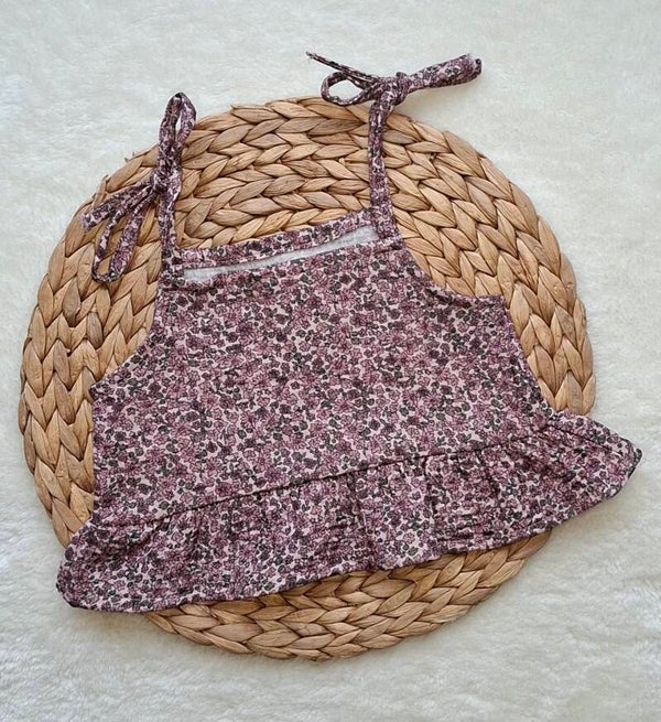 Topje paarse bloemen