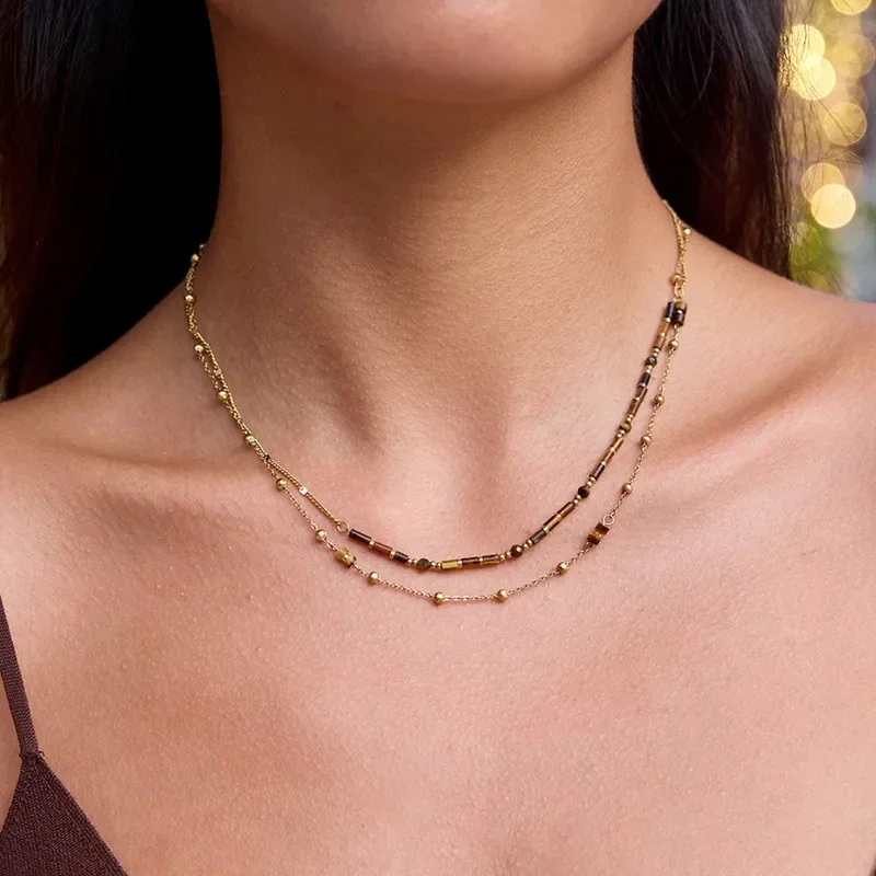 Dubbele tijgeroog ketting goud – layered RVS dames 39–45 cm