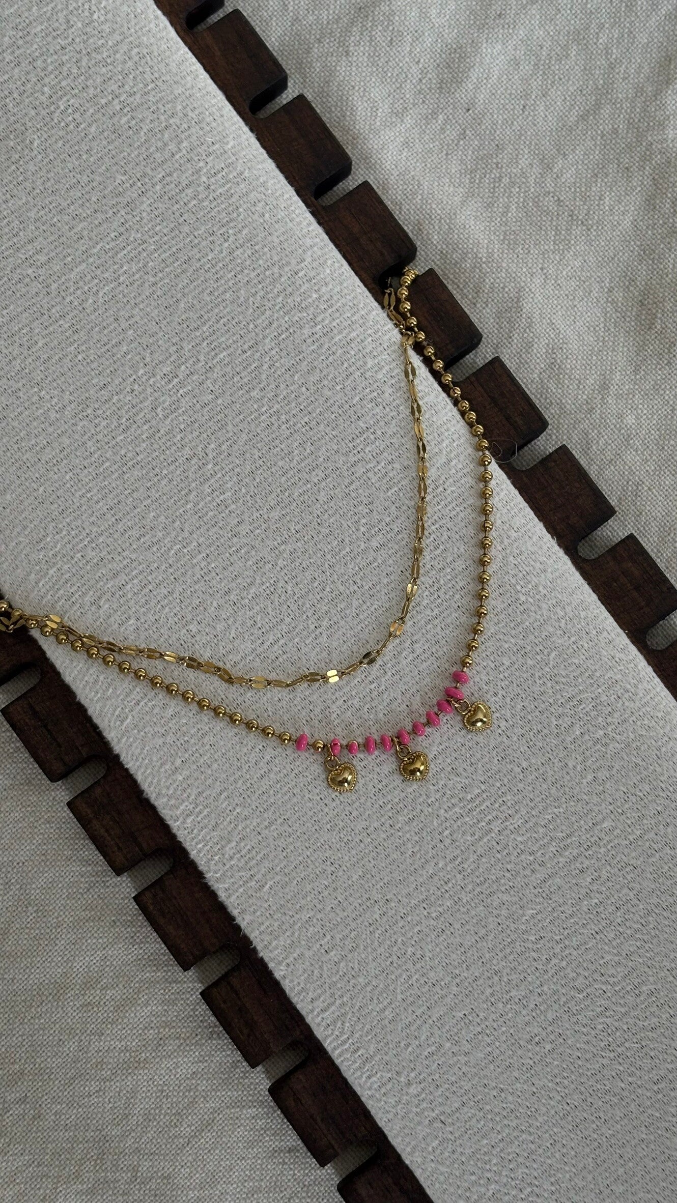 Gelaagde ketting met roze