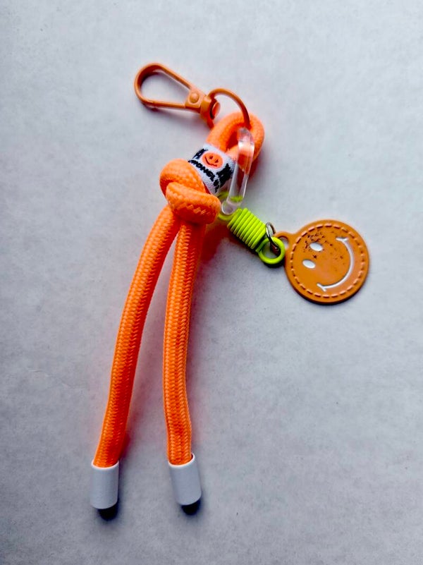 Sleutelhanger // smiley / koord - neonoranje