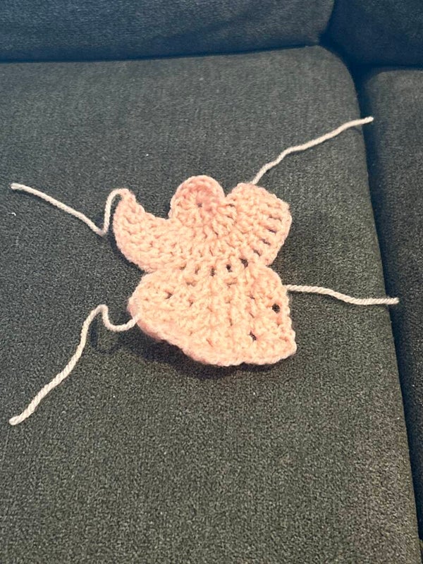 Pink angel crocheted item