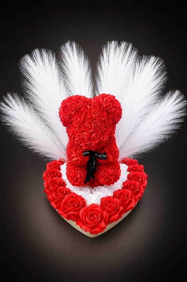 Ourson rouge et blanc rose rouge et plume