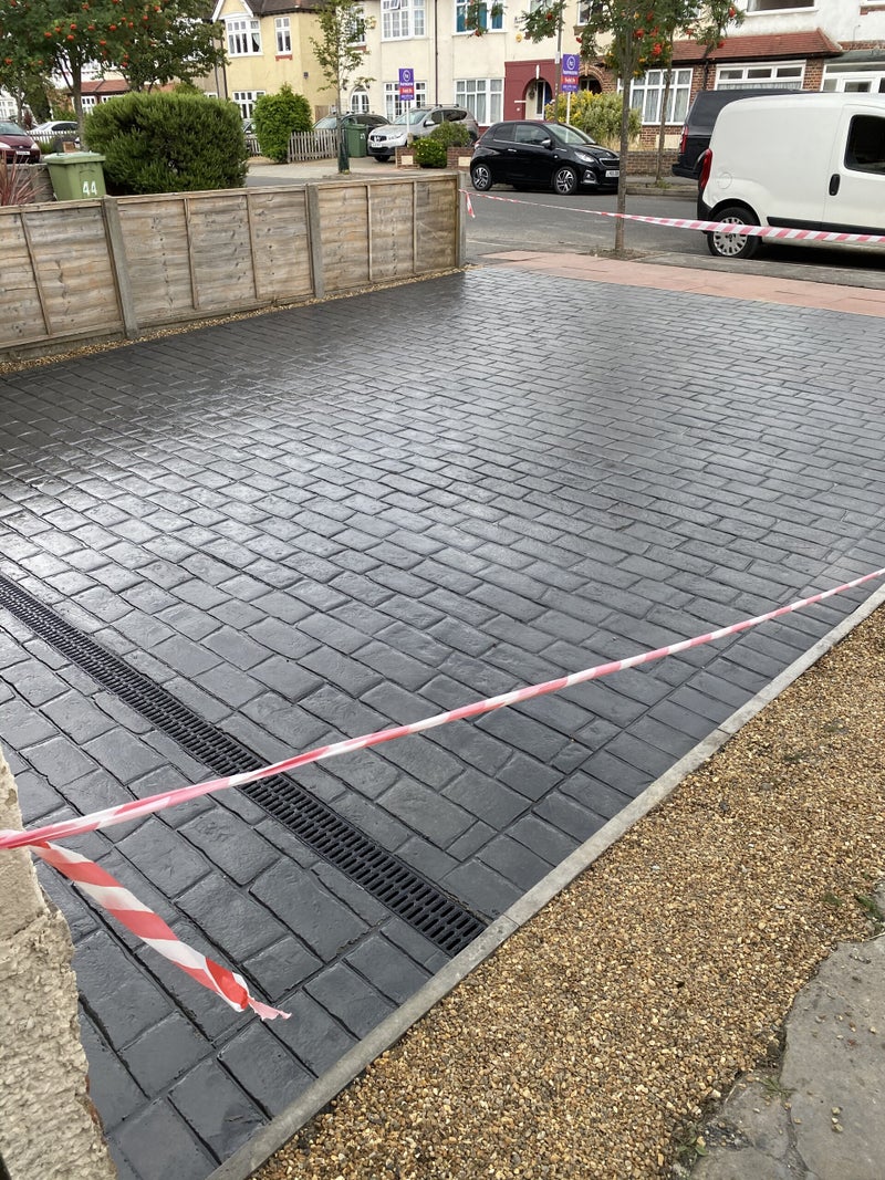 Welling pattern imprinted concrete driveways