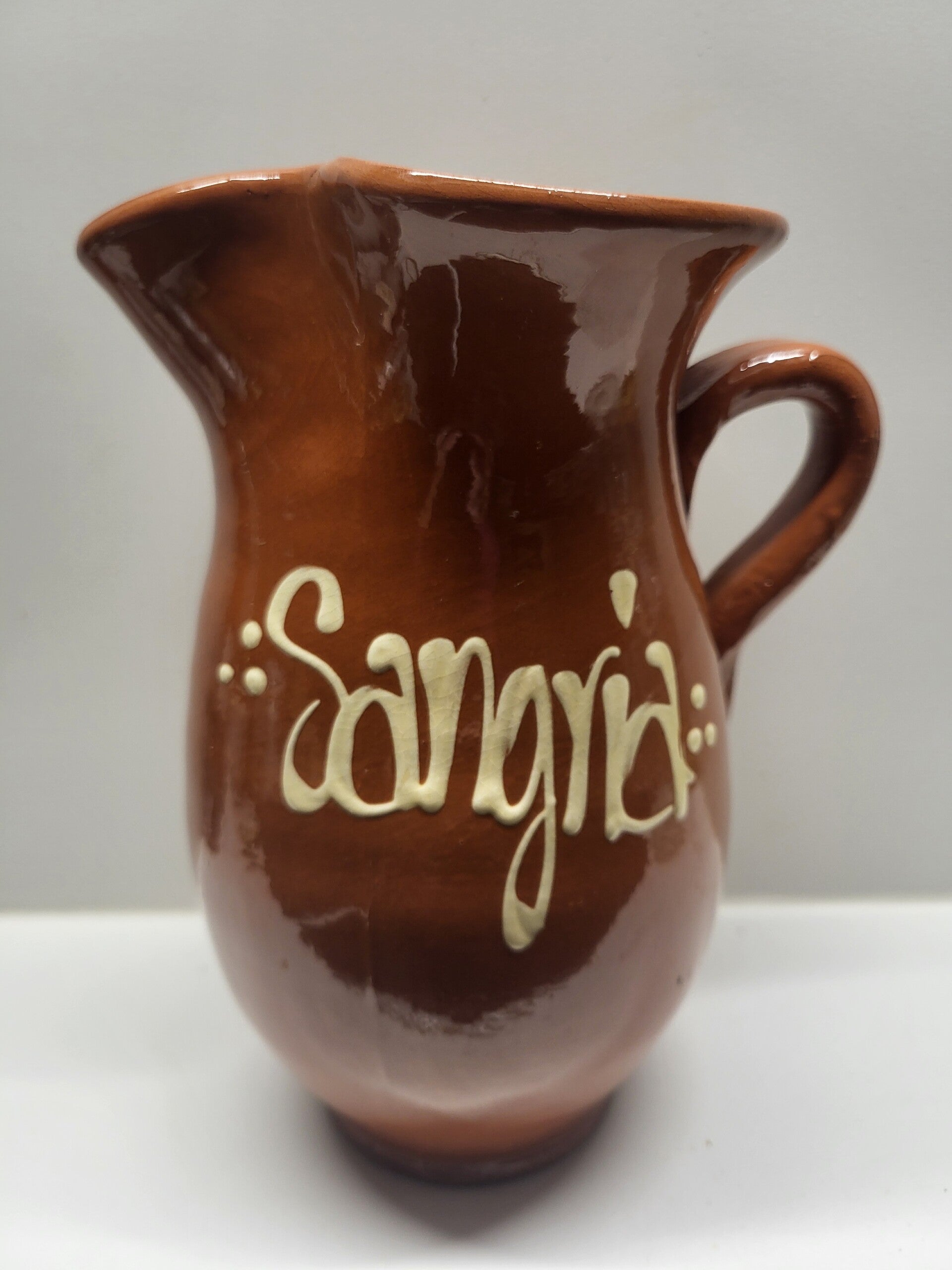 bruine waterkan sangriakan