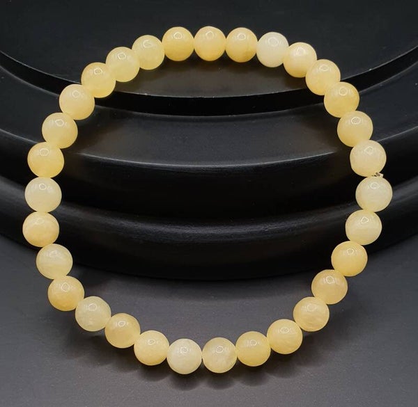 Armband Orangencalcit 6mm