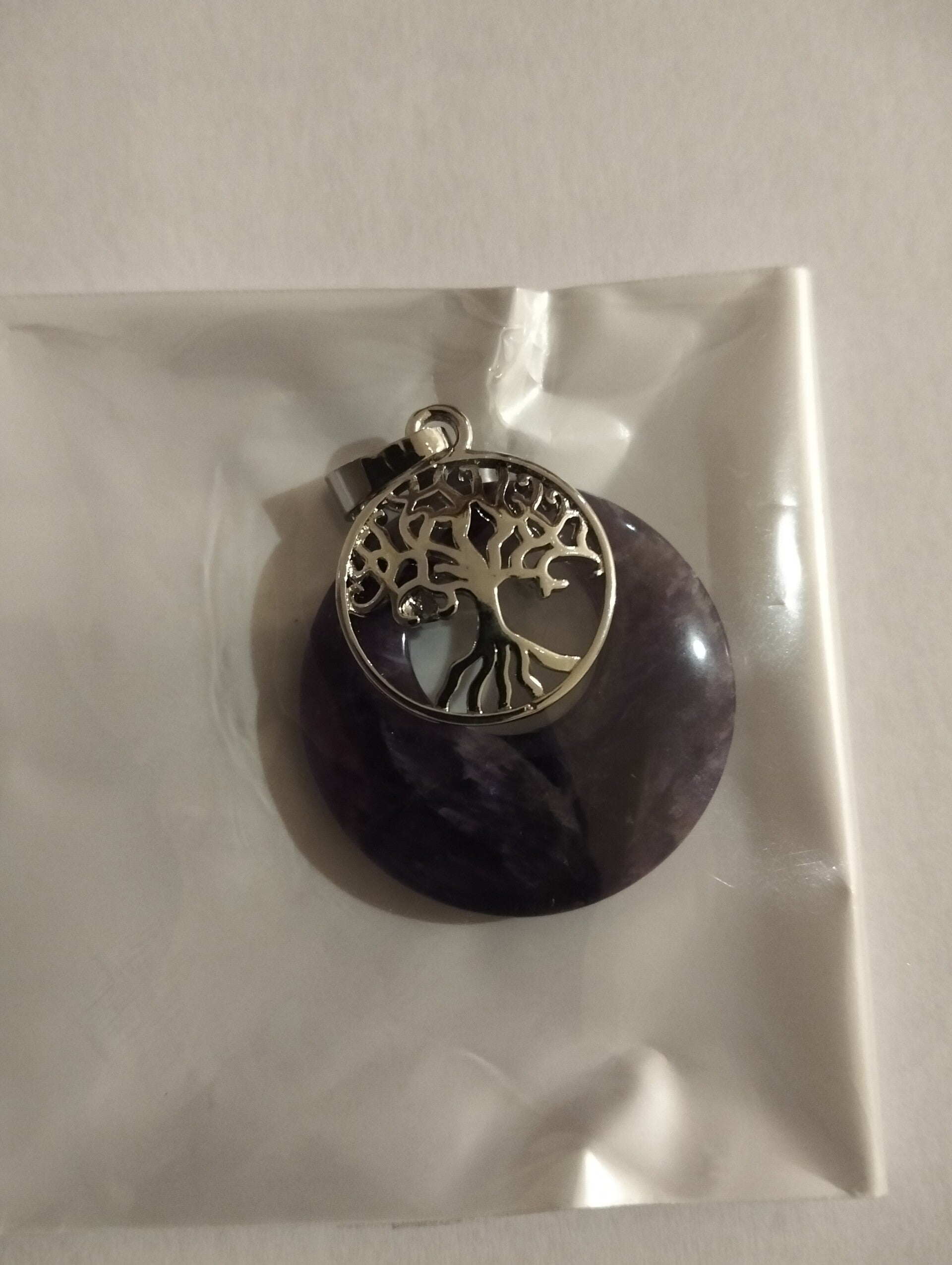 Colgante piedra Amatista con Árbol de la vida en acero