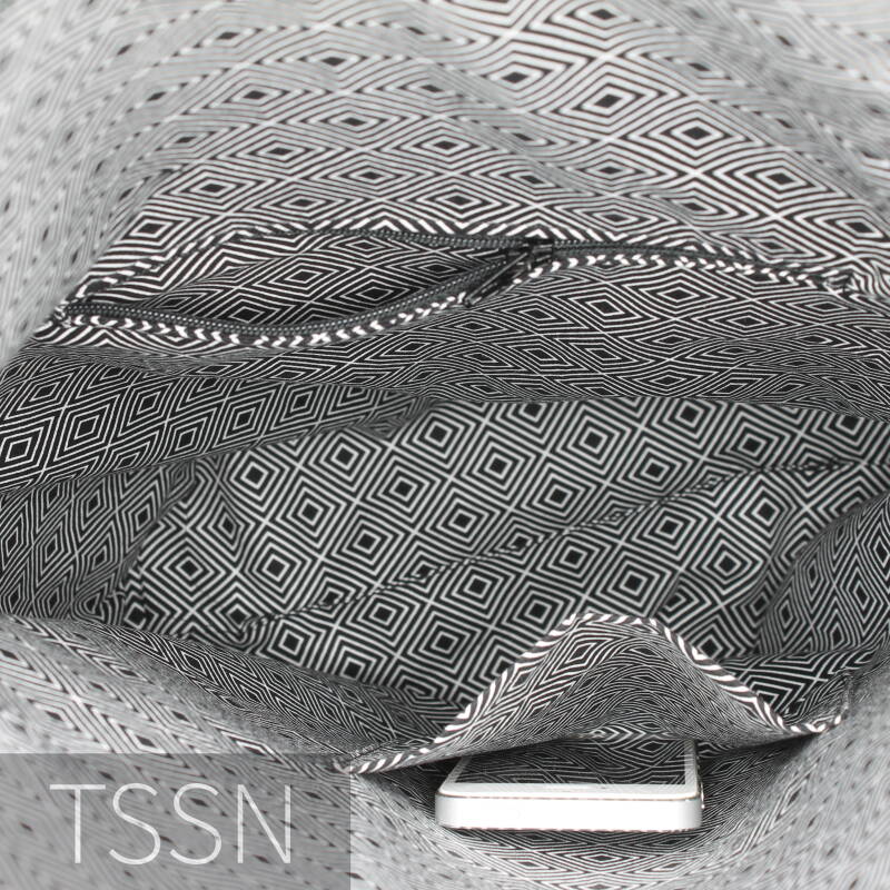 Voering met vakken van schoudertas met flap model Celine 2 gemaakt van oude spijkerbroek en leer van een bank