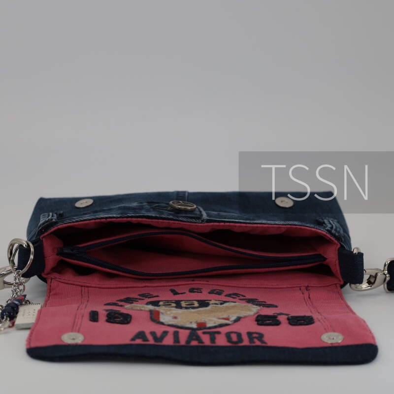 Binnenkant van herinneringstasje model Tessa 6 met afsluitbaar ritsvakje.