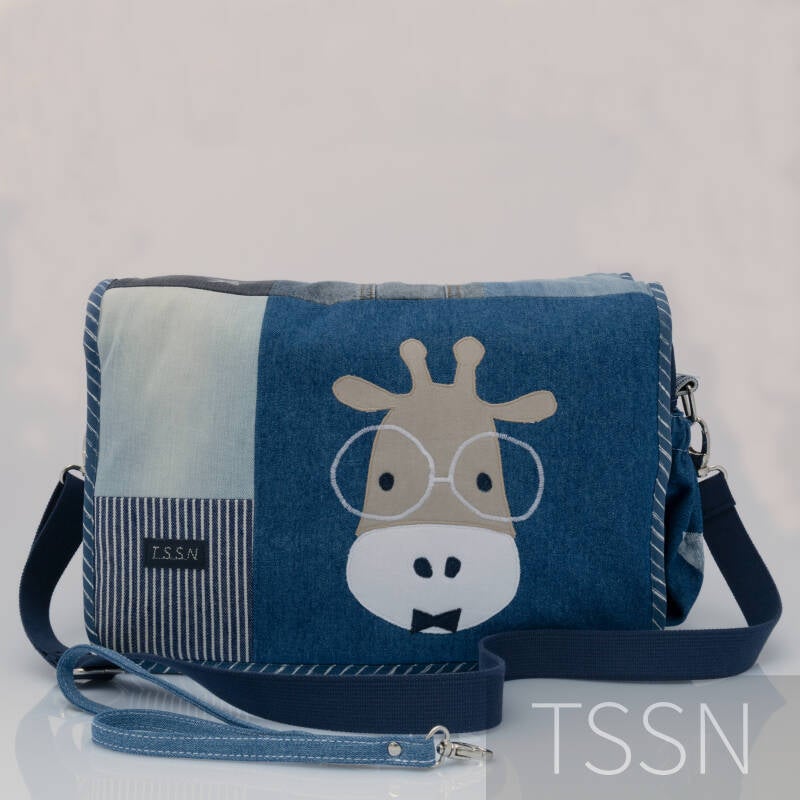 Voorkant denim luiertas.