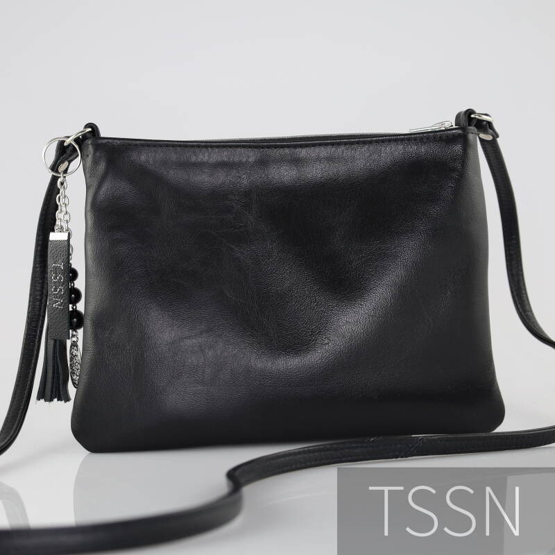 Achterkant tas model Casey gemaakt van leer van een versleten bank,