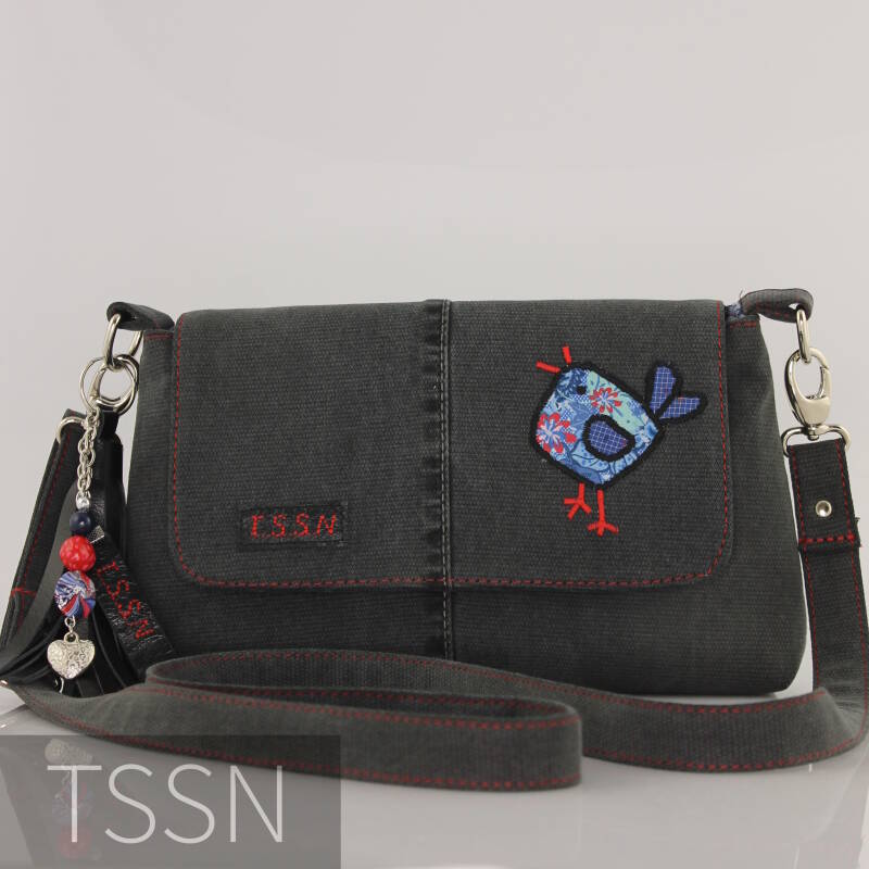 Denim herinneringstasje met geappliceerd vogeltje op de klep.