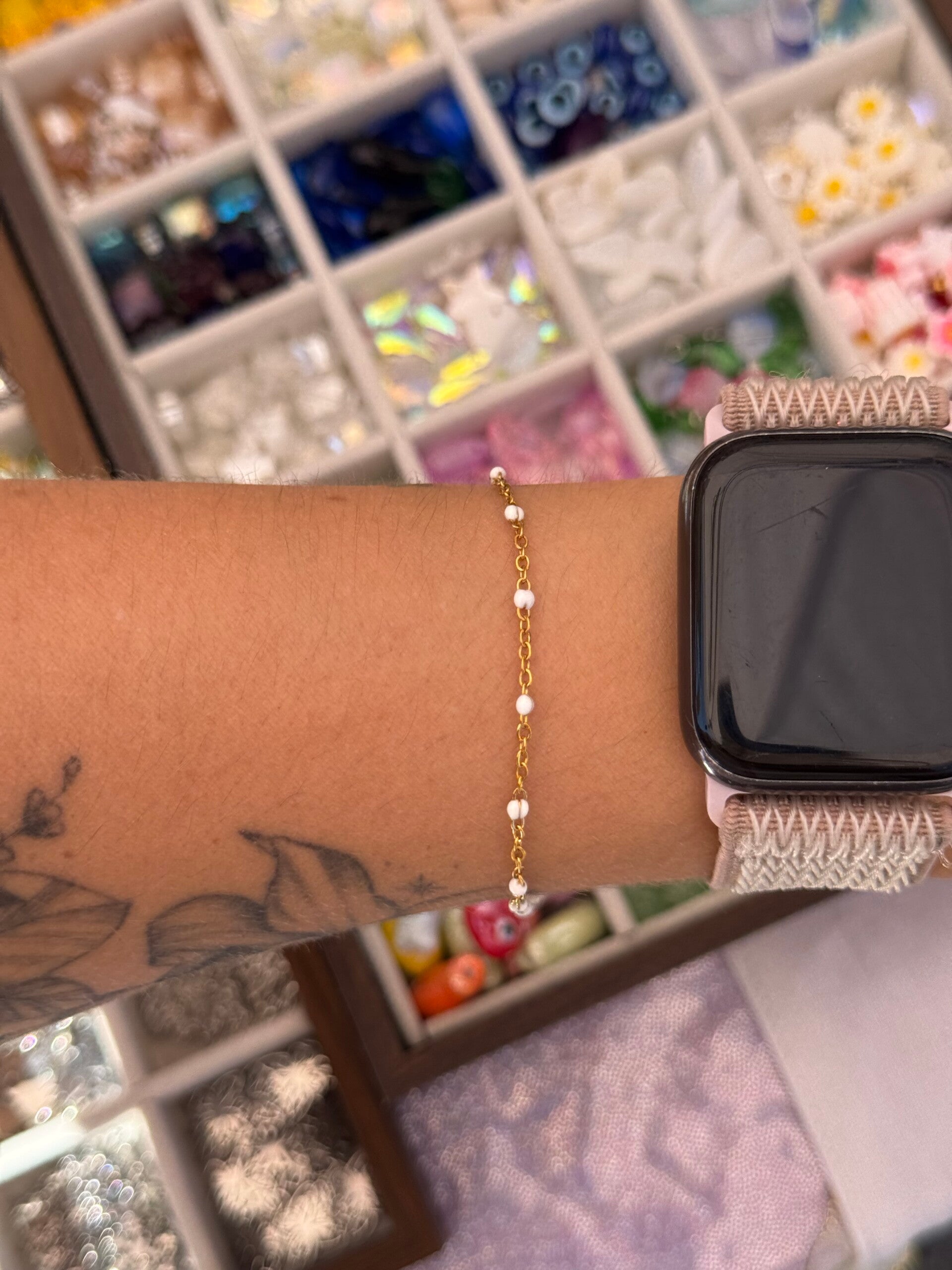 Bracelet maille doré points blanc