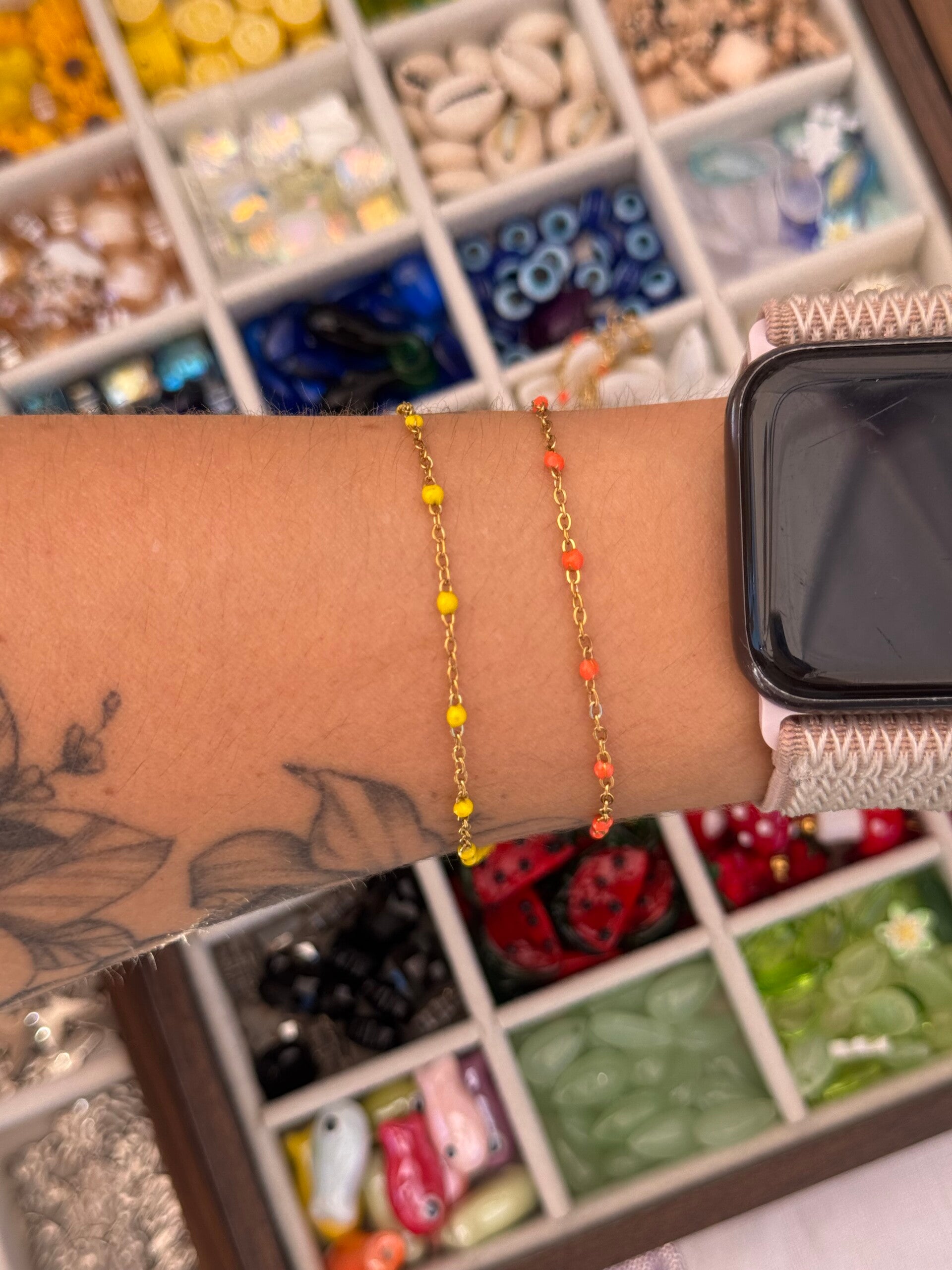 Bracelet maille doré points jaune ou orange