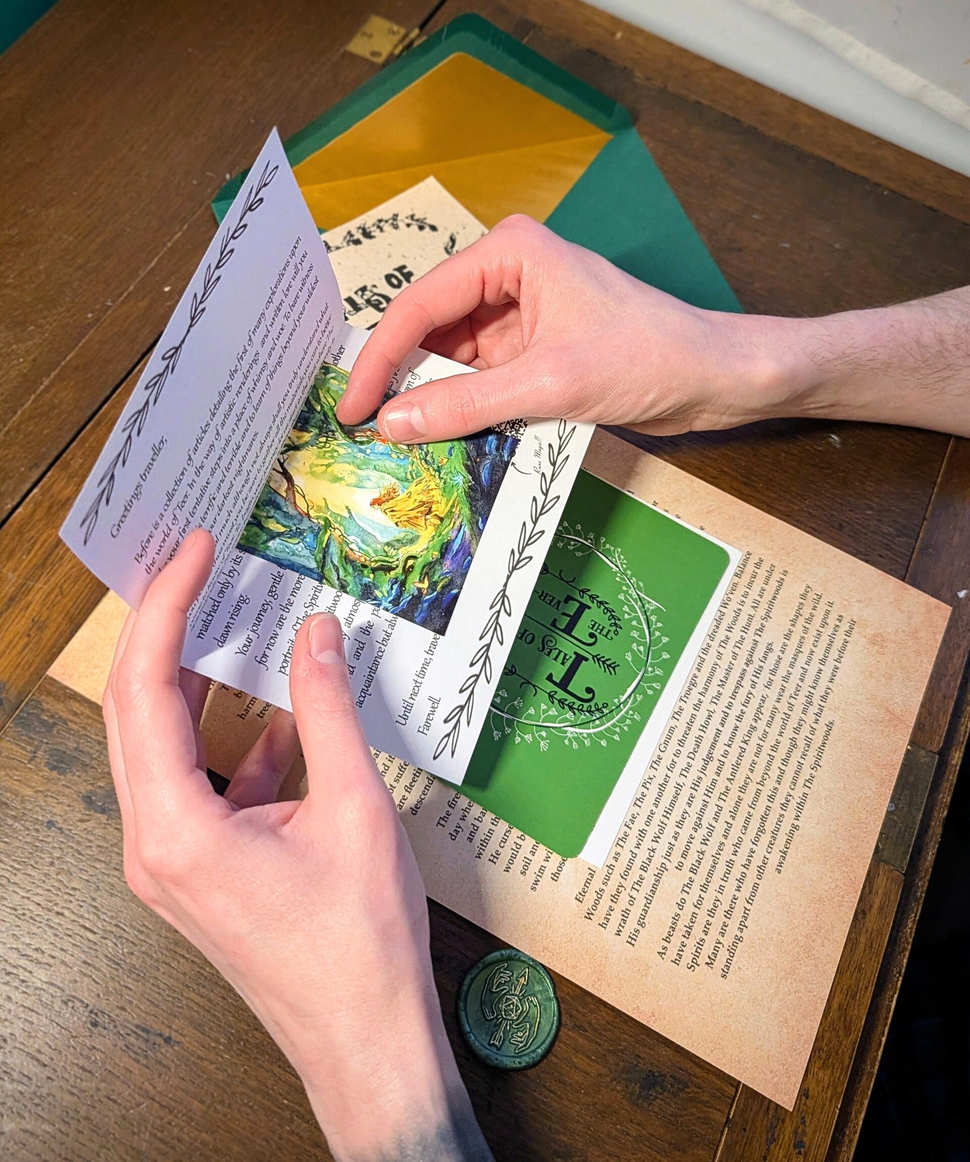 Tales of athe Ever-Awt Mail Club contents displayed on a wooden table, illustrations. sun beaming through the trees. Multi colour flowing watercolor image of woodland of magics, A dark and whimsical fairytale within a fantasy worldairytale 