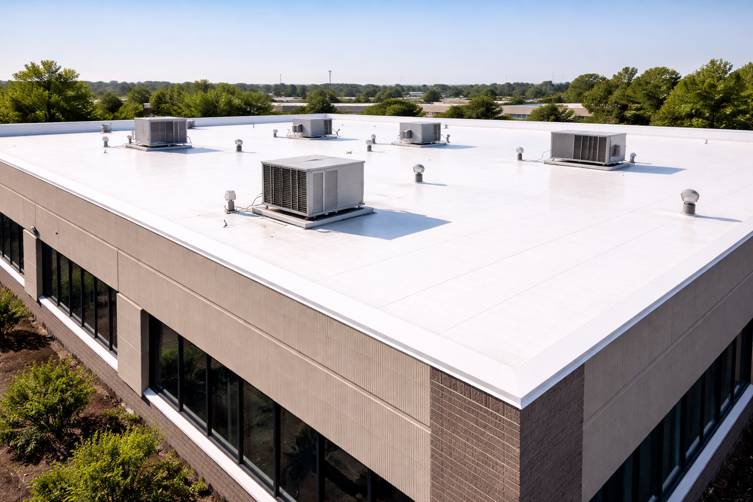 Aging elastomeric membrane roof protected to extend lifespan and delay costly roof replacement