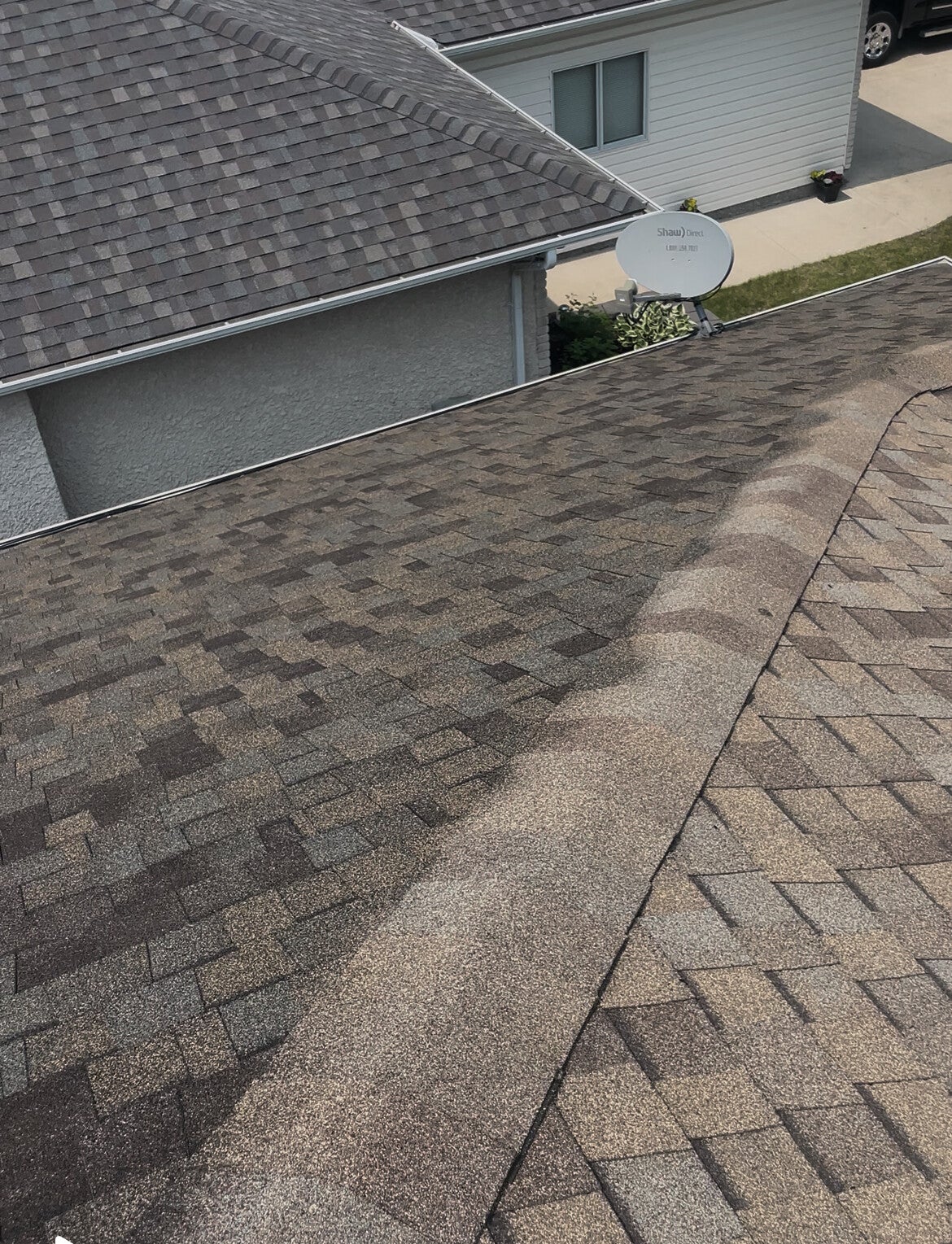 Rejuvenated asphalt shingles with enhanced color after Nano Tech treatment