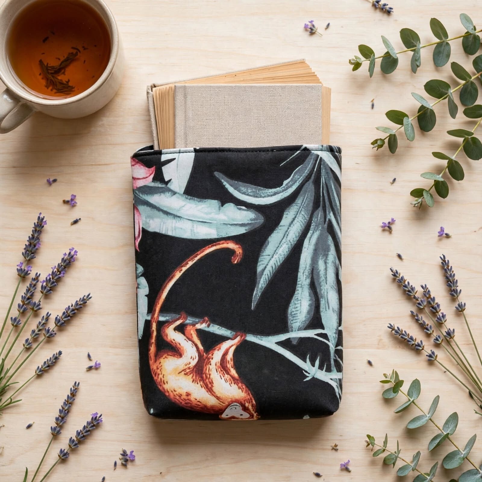 Pochette à livre de poche singe noir