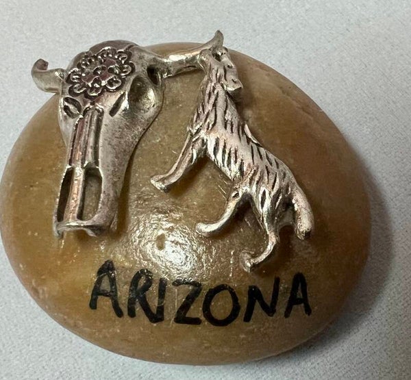 Steer and Wolf Rock Sitter