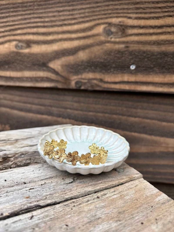 Bangle armband bloemetjes - goud