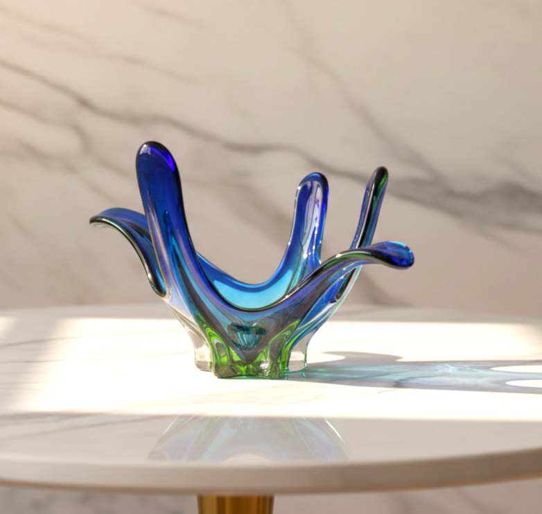 Vintage-inspired wooden credenza styled with geometric vases and mid-century modern decor pieces