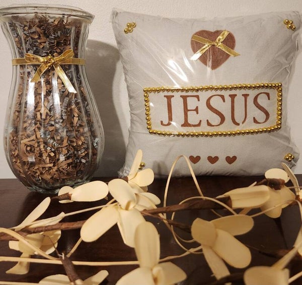 JESUS pillow with a vase